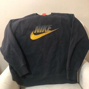 Black and yellow Nike sweater